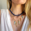 Desert Tide Necklace – Gold Chain with Playful Fish Charms